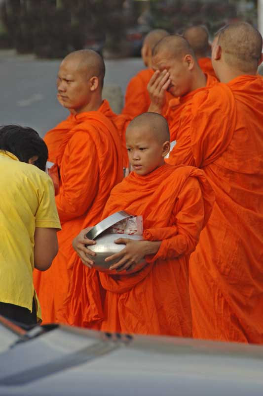 collecting alms-AsiaPhotoStock